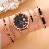 Gift set. Quartz wristwatch and bracelet 5 pcs with artificial black inserts. 